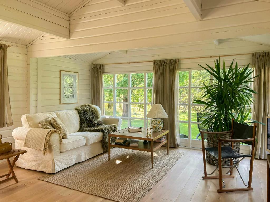 Et opholdsområde på Summerhouse In Forest Near Rørvig Beach