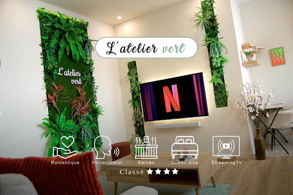 Et tv og/eller underholdning på L'atelier vert - SPA, Suite Luxe, Proche Hypercentre - Classé 4 étoiles