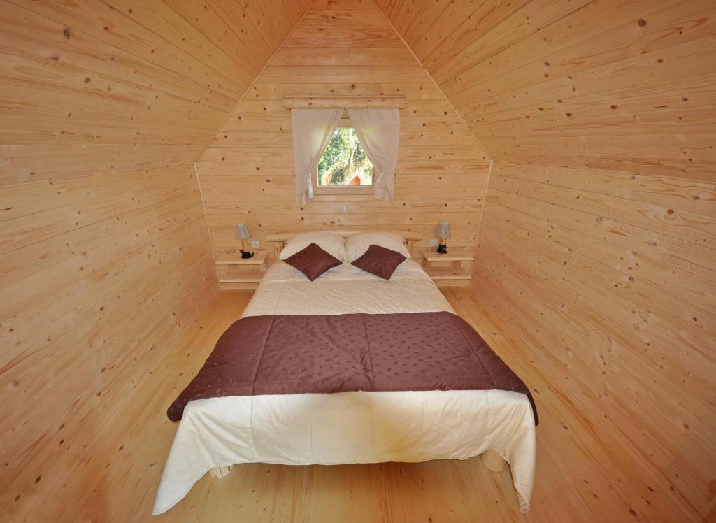 Postel nebo postele na pokoji v ubytování Glamping Organic Farm Slibar