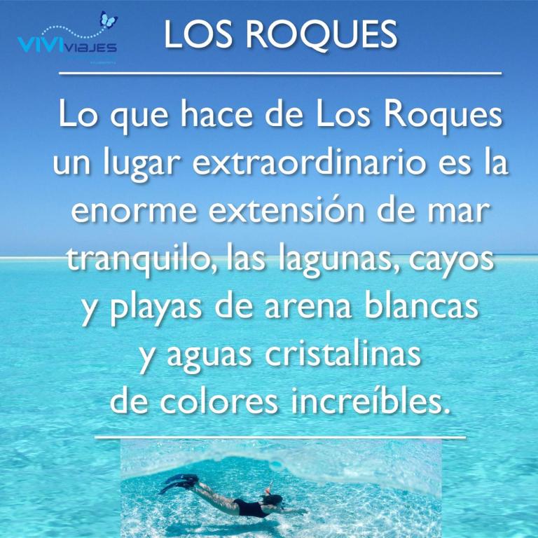 a woman swimming in the water in the ocean at Posada Doña Carmen in El Roque