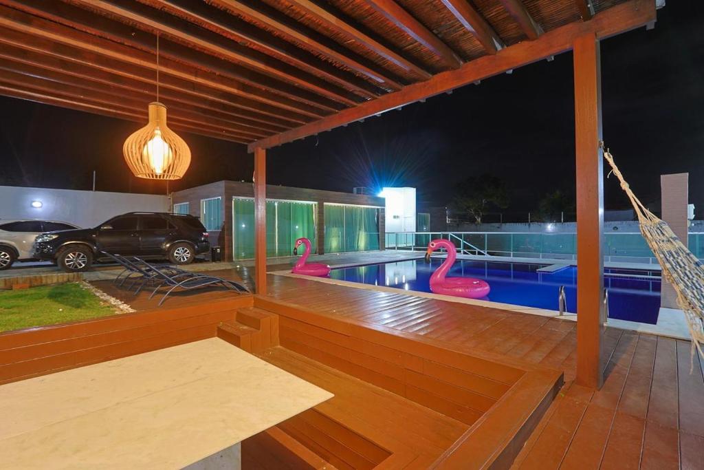 Swimmingpoolen hos eller tæt på PF Lounge - Praia do Forte e Imbassaí 3km