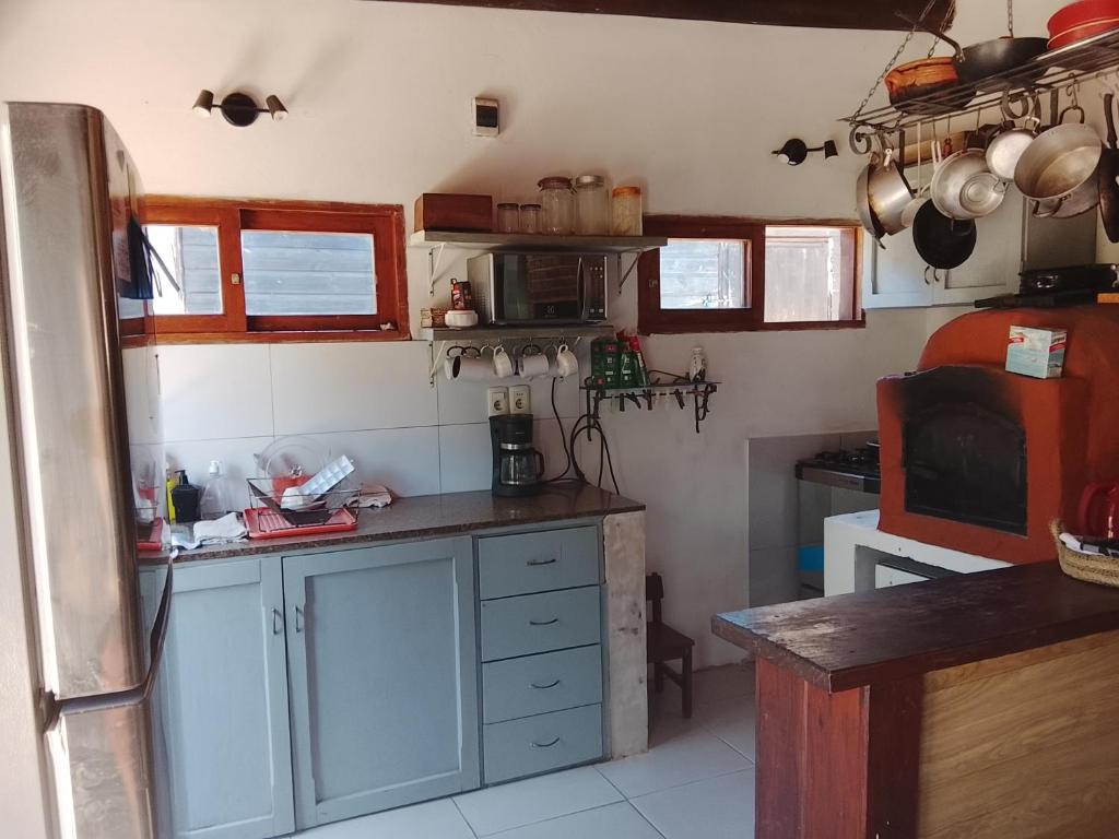 Nhà bếp/bếp nhỏ tại Metamorfosis Aguada