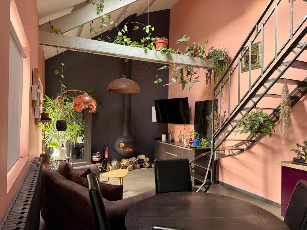 TV a/nebo společenská místnost v ubytování La petite Maison Cocooning et son petit jardin cosy