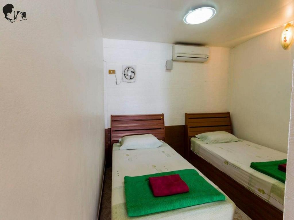 Postel nebo postele na pokoji v ubytování VN Guesthouse