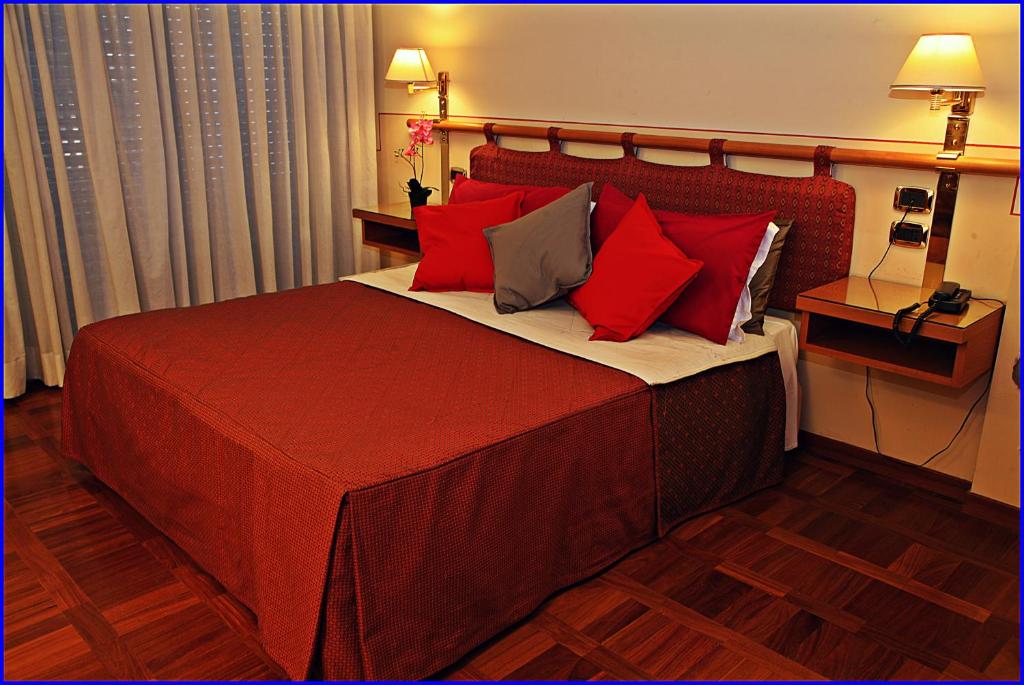Postel nebo postele na pokoji v ubytování Hotel Meeting