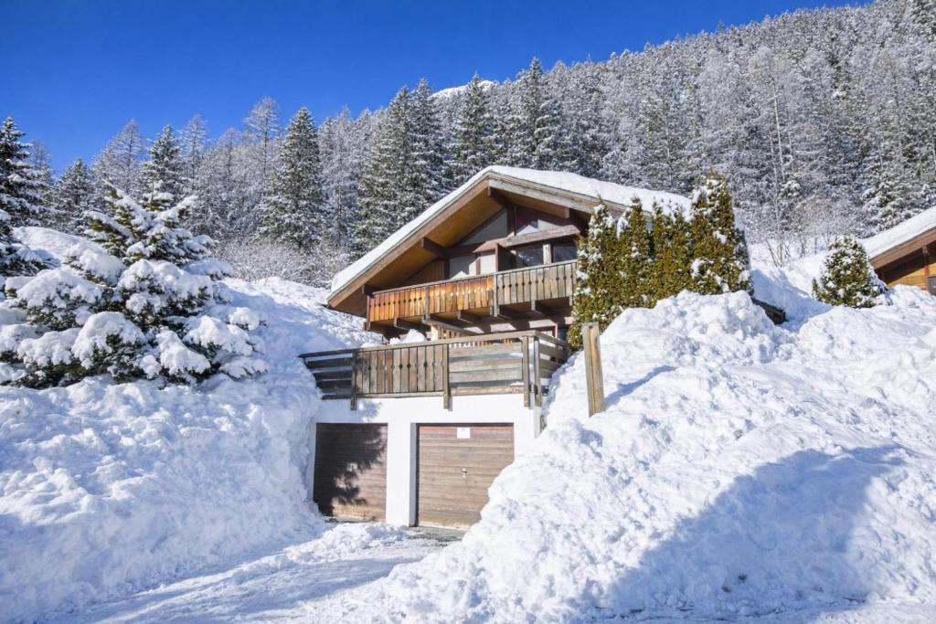 a cabin in the snow with a lot of snow at Chalet Résidence Chantey Mourry 6 - Happy Rentals in Argentiere