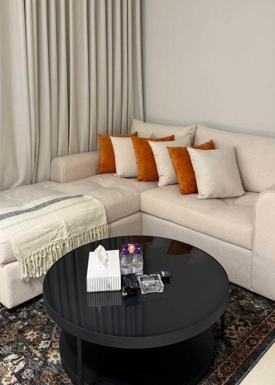 Et opholdsområde på Private apartment with a classy character