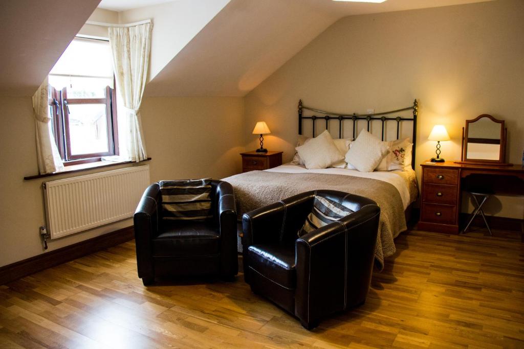 Een bed of bedden in een kamer bij Murray's Mountain View