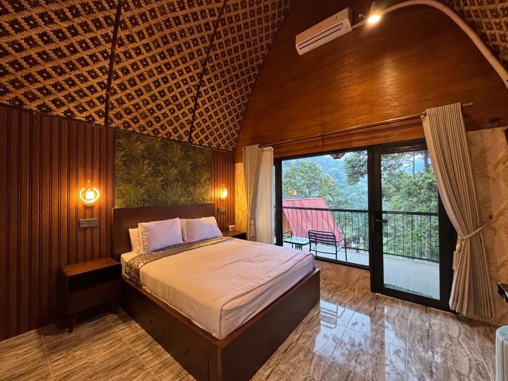 Giường trong phòng chung tại Villa Garden Grove