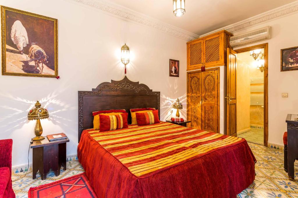 Postel nebo postele na pokoji v ubytování Riad Mouna