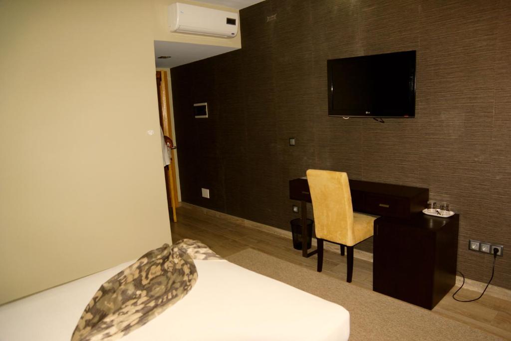 TV a/nebo společenská místnost v ubytování Hotel Praia Confort