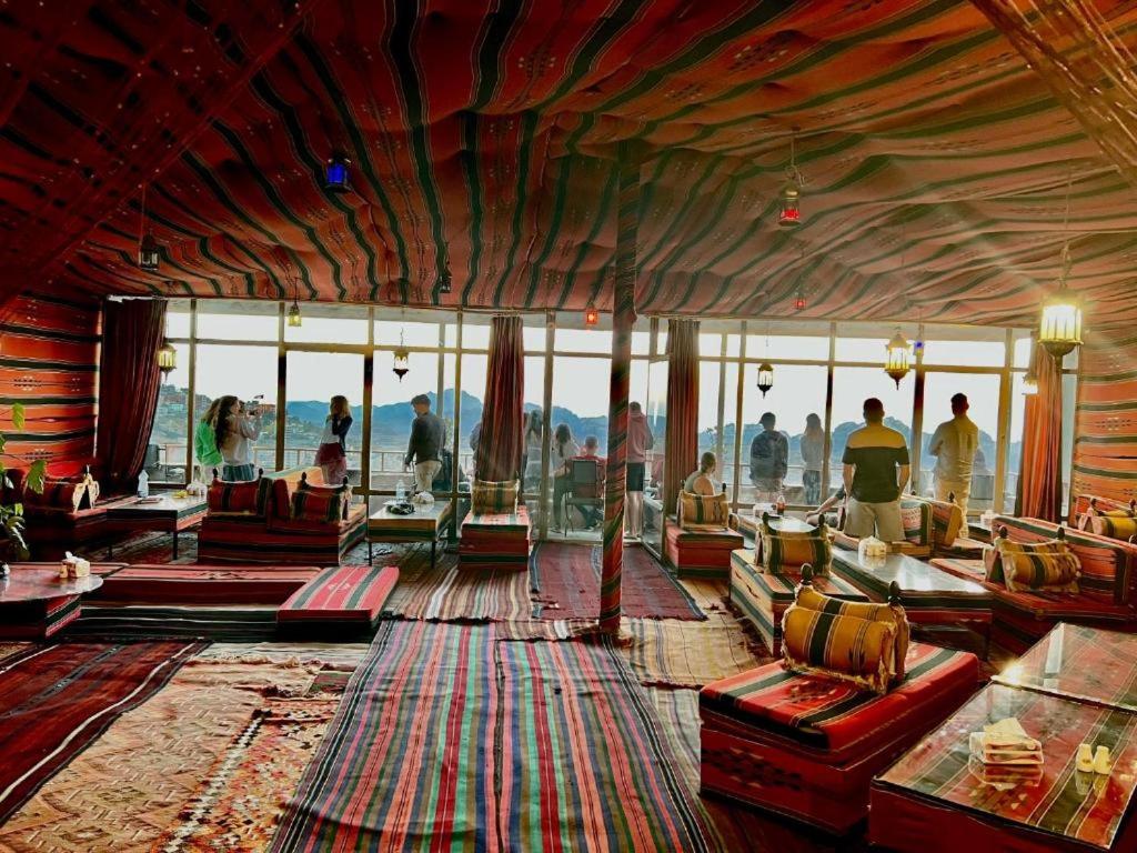 a living room with a view of the city at Rocky Mountain Hotel Jordan in Petra