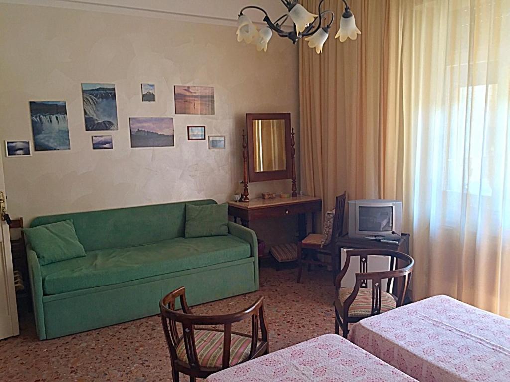 Postel nebo postele na pokoji v ubytování B&B Gelone