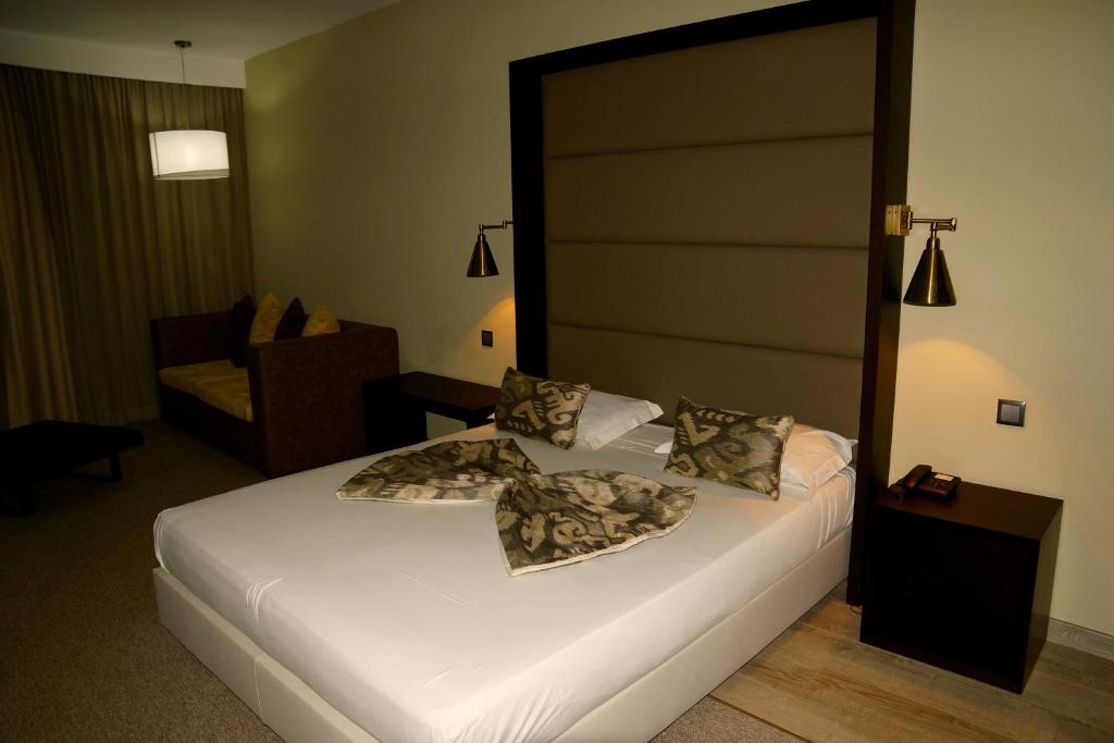 Ліжко або ліжка в номері Hotel Praia Confort