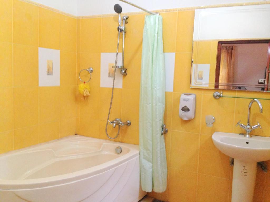 Koupelna v ubytování Eeshani Guest Inn