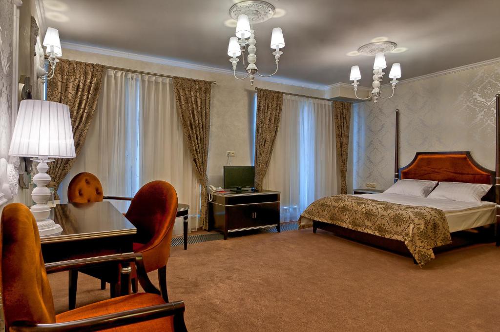 Postel nebo postele na pokoji v ubytování Hotel Santana