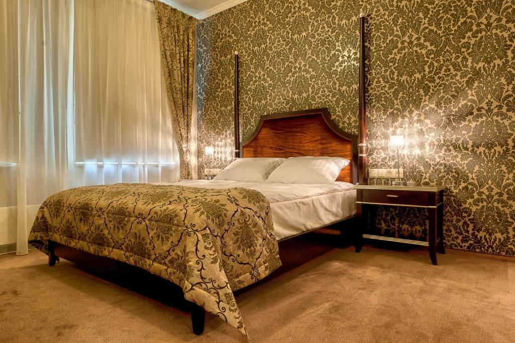 Postel nebo postele na pokoji v ubytování Hotel Santana