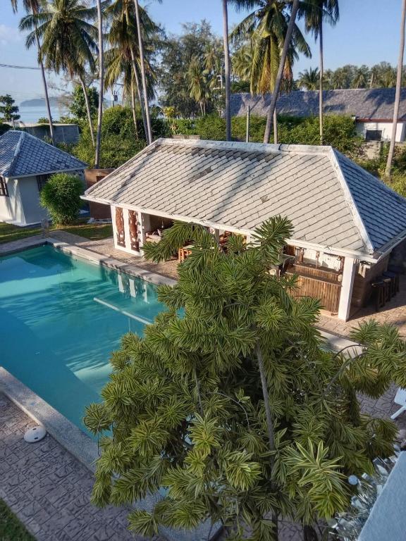 an image of a house with a swimming pool at Ban thale in Koh Samui