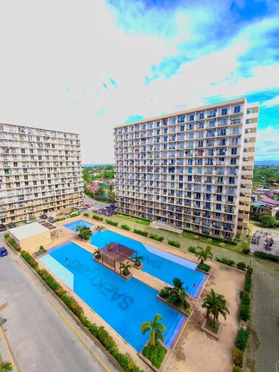 an aerial view of a resort with two pools at Richloves Haven in Suba