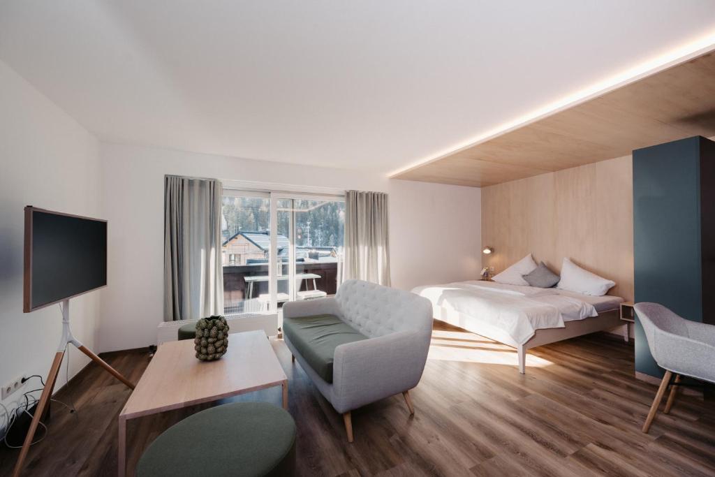 Giường trong phòng chung tại Ferienwohnungen ECKART, GABRIELHAUS