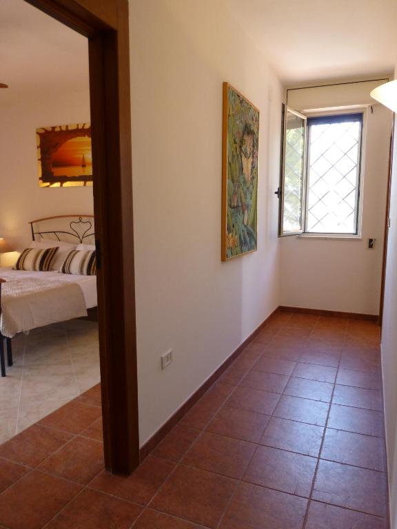 Postel nebo postele na pokoji v ubytování Villa Suzannah