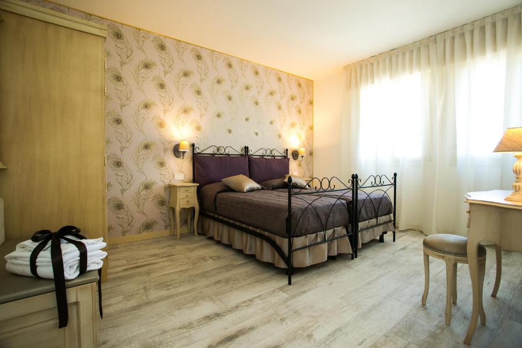 Postel nebo postele na pokoji v ubytování Guest House Dolce Laguna