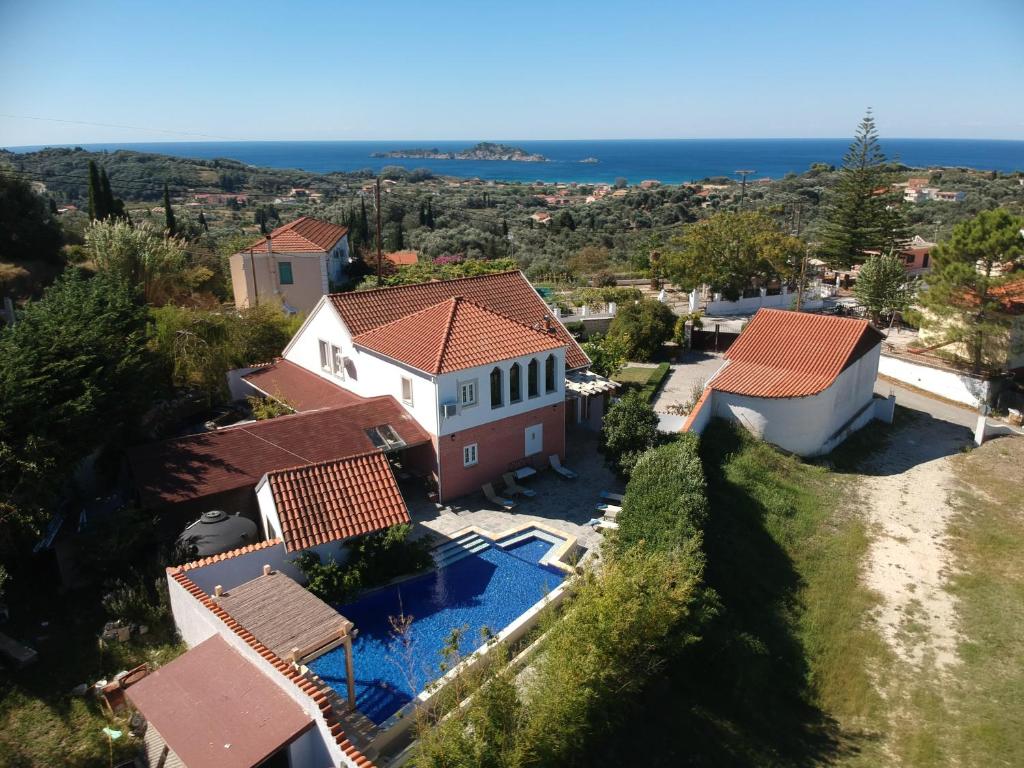 an aerial view of a house with a swimming pool at Buddha Villa in Arillas