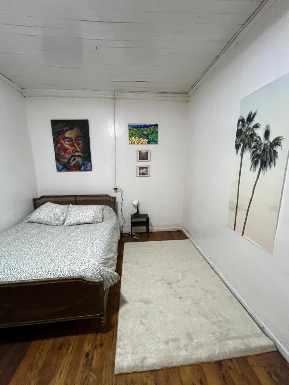 Giường trong phòng chung tại Casa Mirador Pichilemu