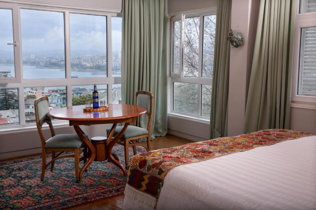 En eller flere senge i et værelse på Casablu Hotel