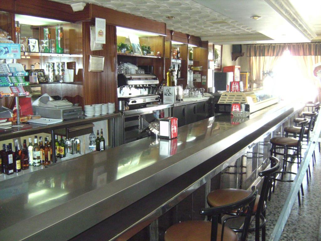 Lounge nebo bar v ubytování Hostal El Polígono
