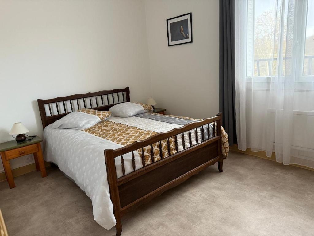 Postel nebo postele na pokoji v ubytování Appartement tout confort aux portes du Sancy