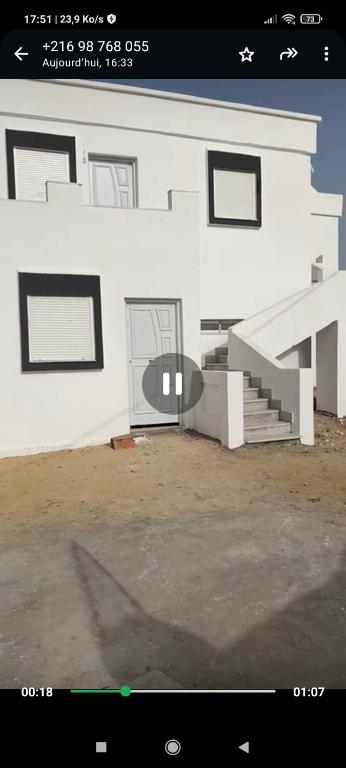 a rendering of a white house with stairs and windows at Maison a midoun in Midoun