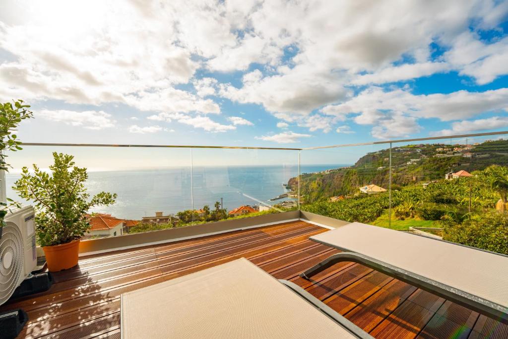 a balcony with a view of the ocean at The Viewpoint by Eurostay in Ribeira Brava