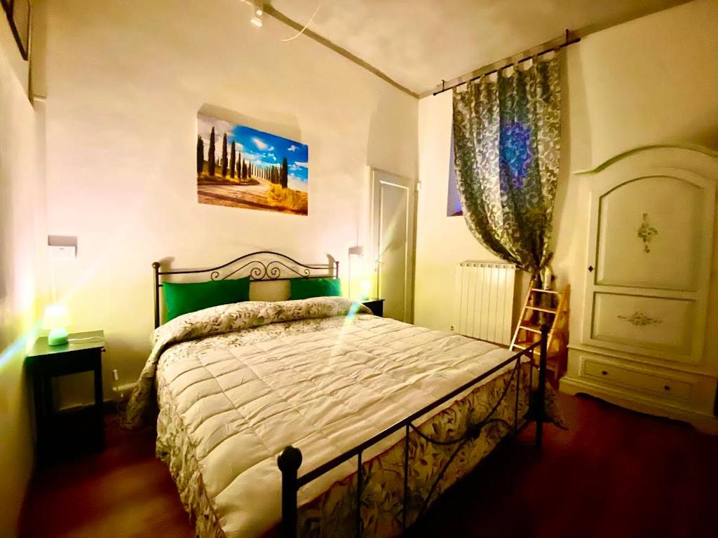 En eller flere senge i et værelse på Casa Vacanze Michelangelo