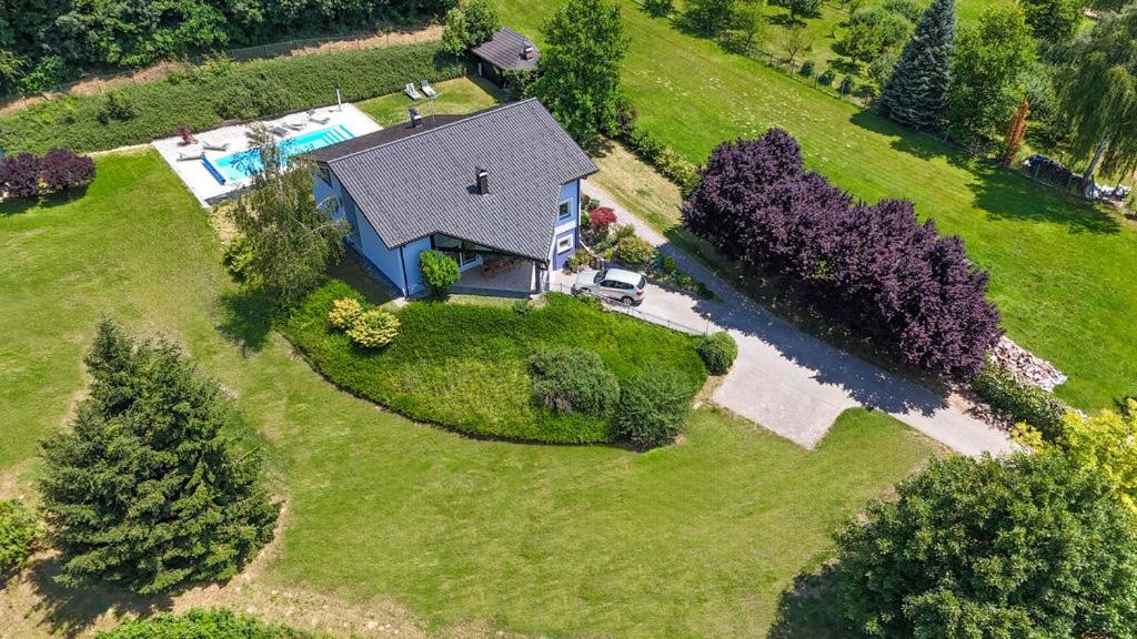 an aerial view of a house with a pool at Private Pool Villa with Garden & Nature by Destination GREEN Croatia in Pregrada