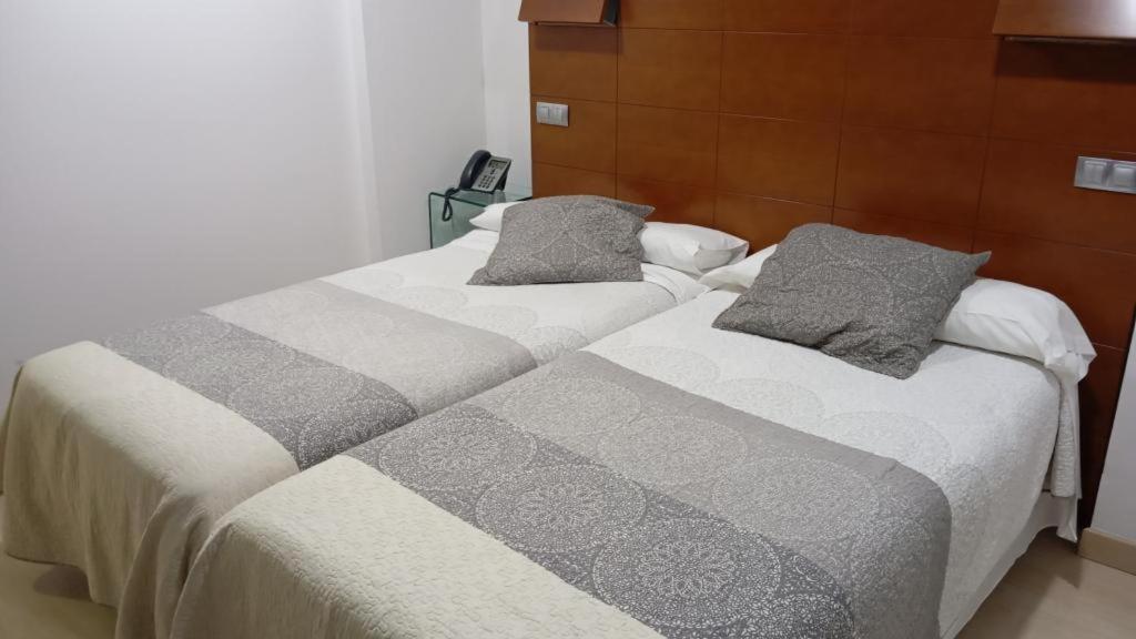 Postel nebo postele na pokoji v ubytování Nap