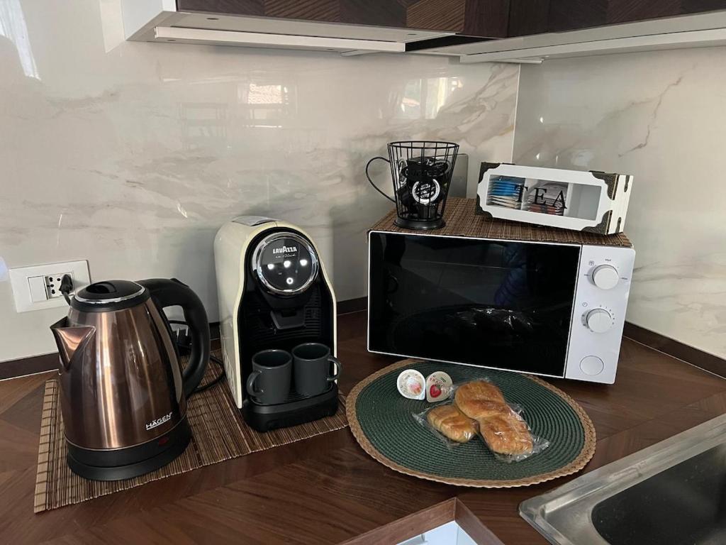 Køkken eller tekøkken på Residenza degli Olivi