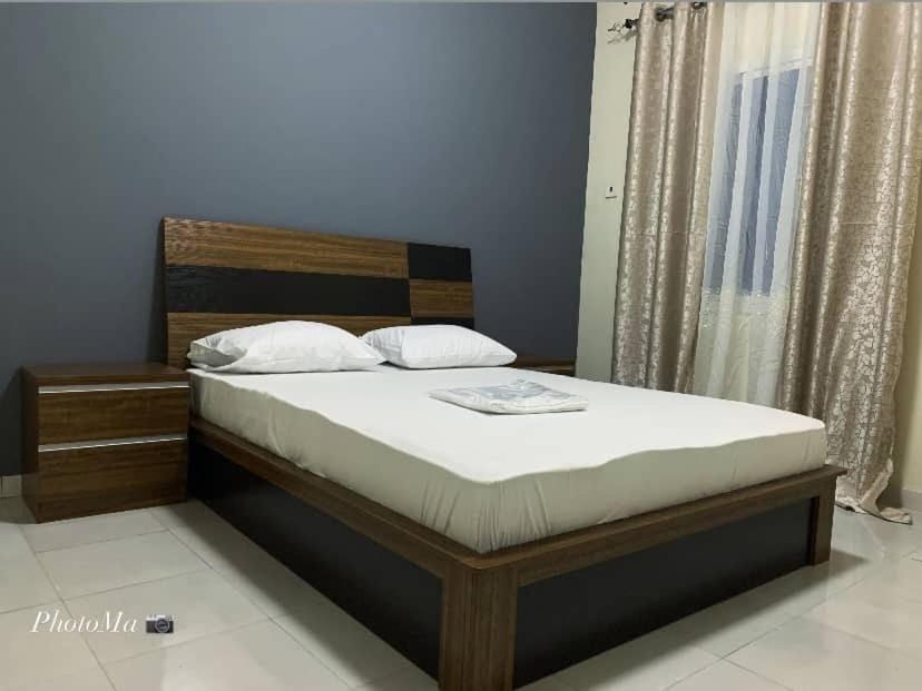 Llit o llits en una habitació de Nova apartments