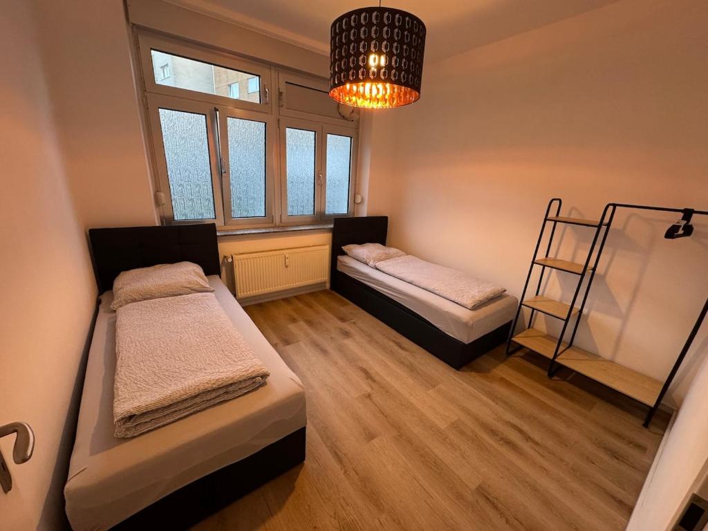 Giường trong phòng chung tại City Apartment