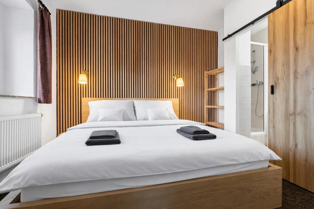 En eller flere senge i et værelse på Forest House near Klínovec