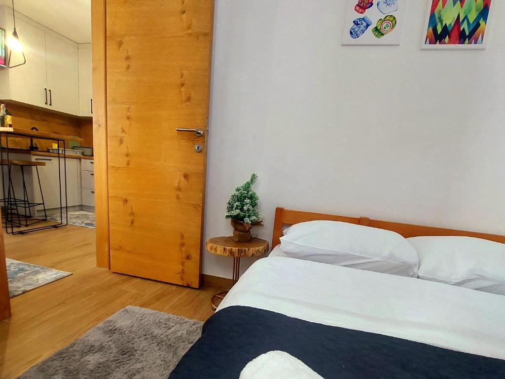 En eller flere senge i et værelse på Bianca