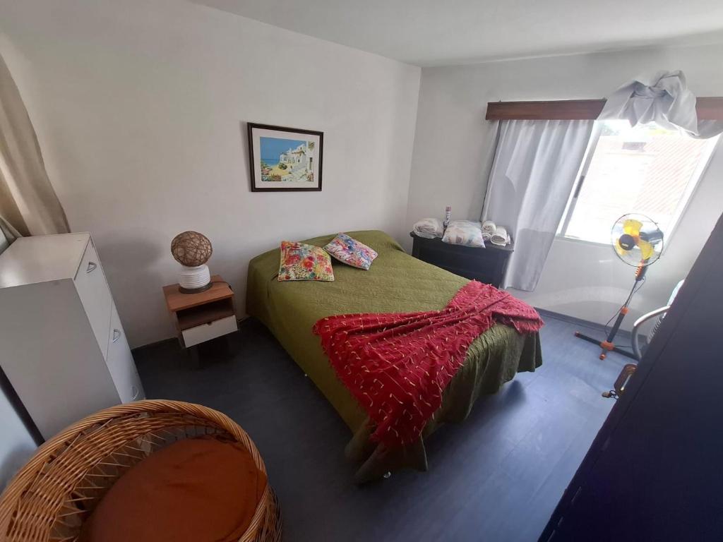 Postel nebo postele na pokoji v ubytování Departamento frente al mar