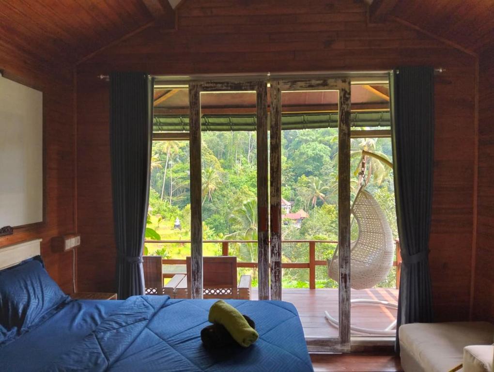 Postel nebo postele na pokoji v ubytování Bali namping