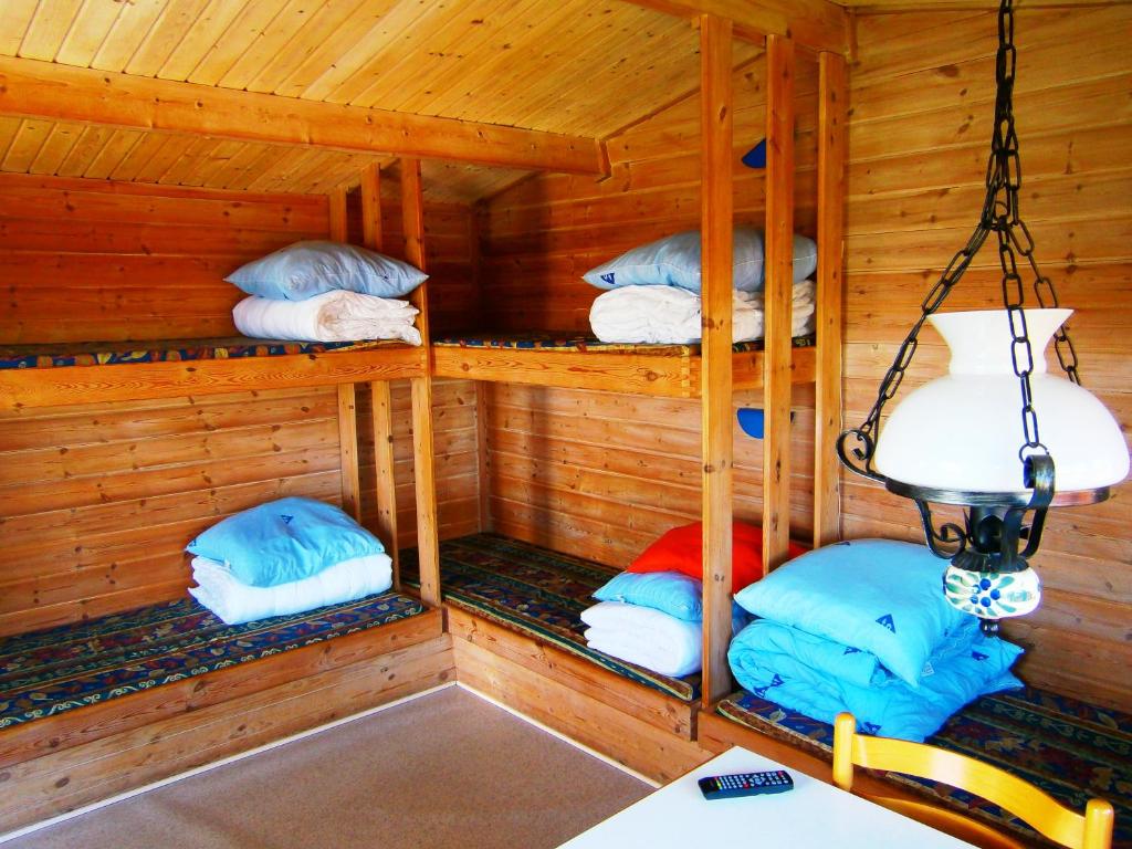 Palanda nebo palandy na pokoji v ubytování Helsingør Camping & Cottages Grønnehave