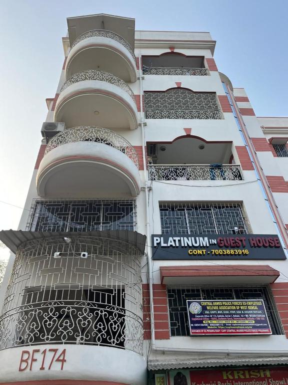 a tall building with gates in front of it at PlatinumIN Guesthouse in kolkata