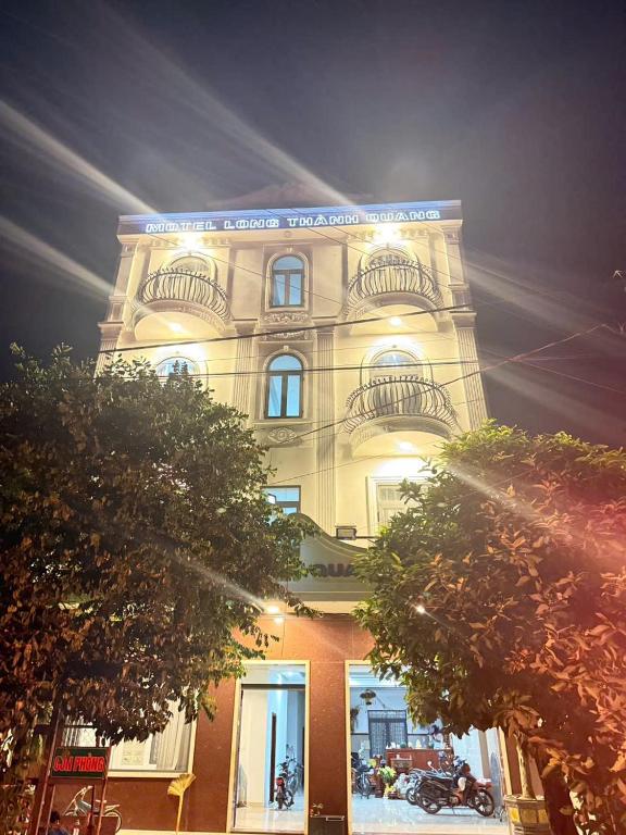a tall building with a light on top of it at Motel Long Thành Quang in Long Thành