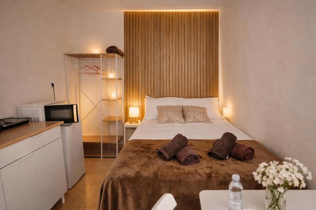 Giường trong phòng chung tại Estudio para pareja en Jaén