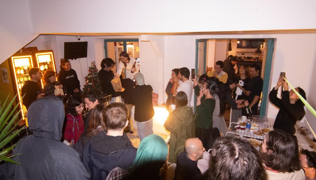 a crowd of people standing in a room at BE BOLD HOSTEL in Antalya