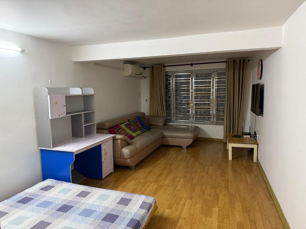 En eller flere senge i et værelse på Minh Khai homestay