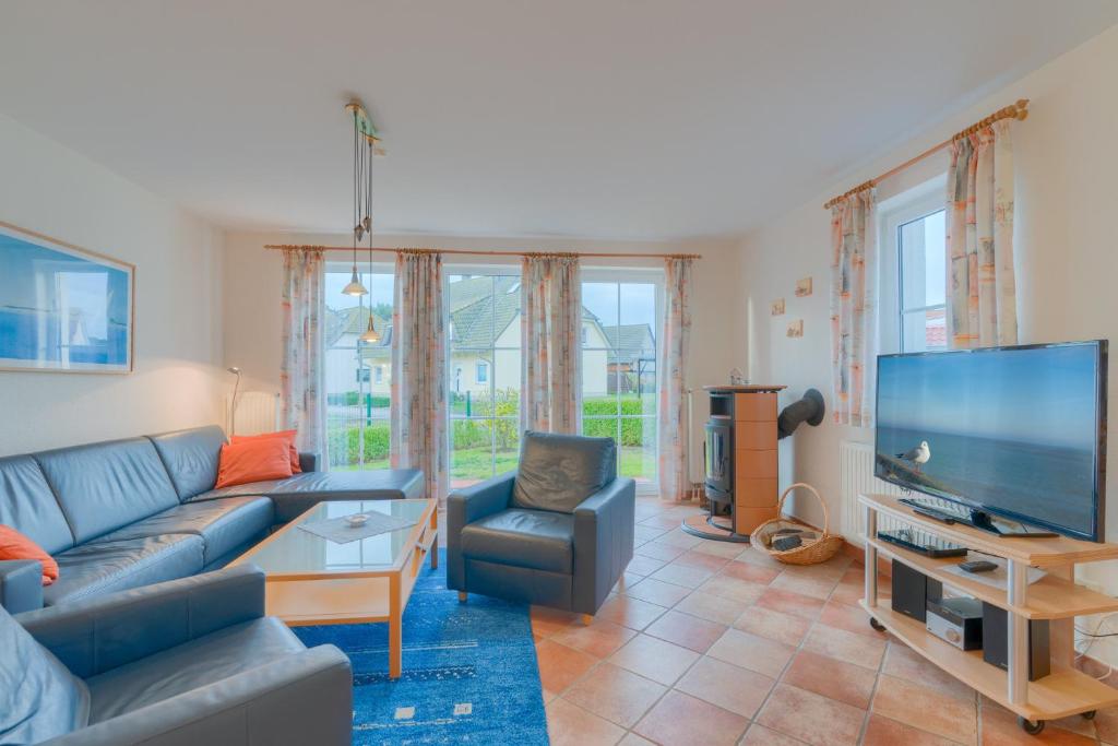 TV/trung tâm giải trí tại Strandhaus Thiessow, Wohnung mit 2 Bädern